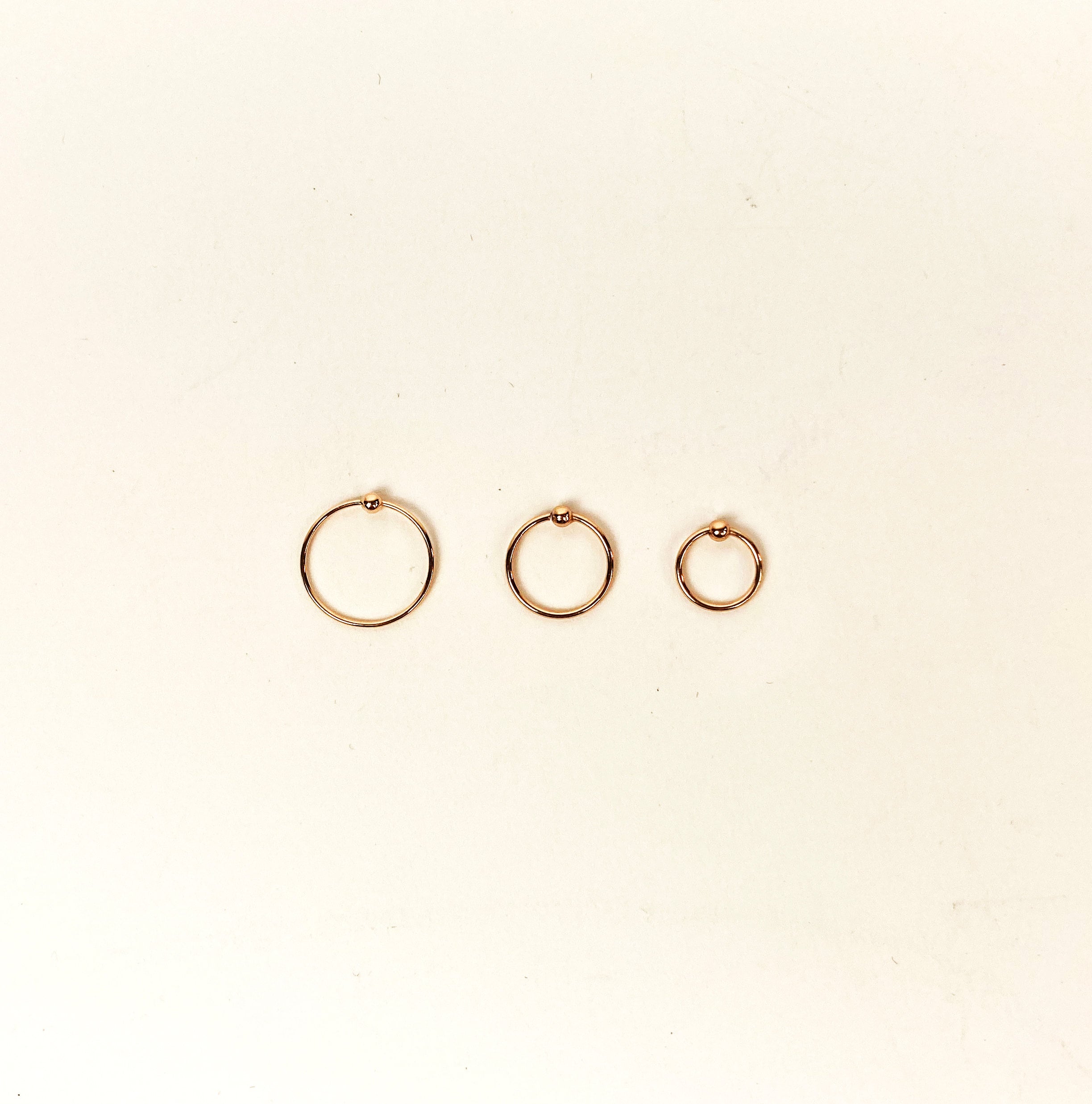 Amazon.com: 14k Rose Gold Filled Adjustable Metal Hoop Nose Ring - 24 Gauge  5-6mm : Handmade Products